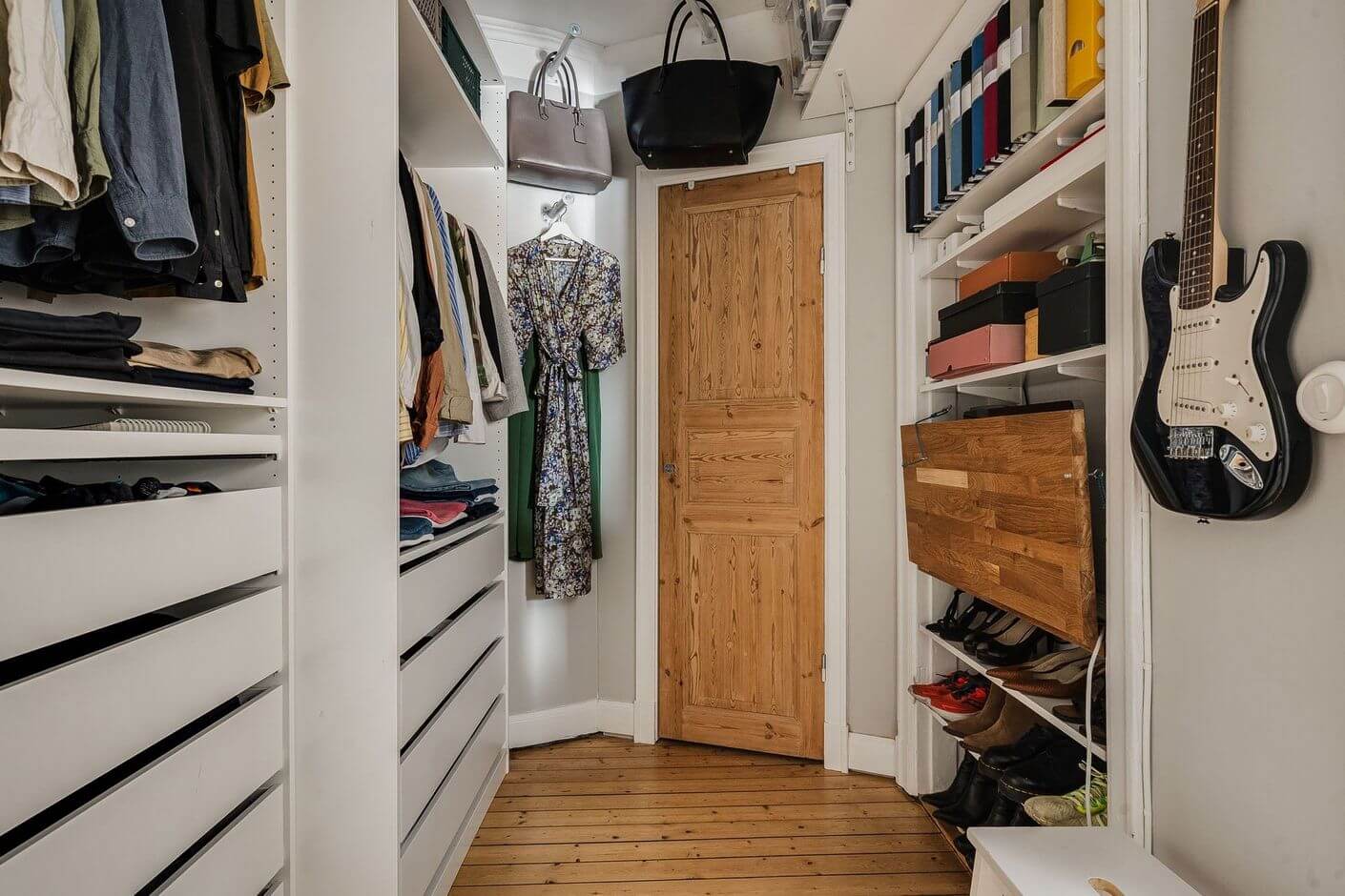 A Swedish Family Apartment with a Butter Yellow Kitchen 16 walk in closet