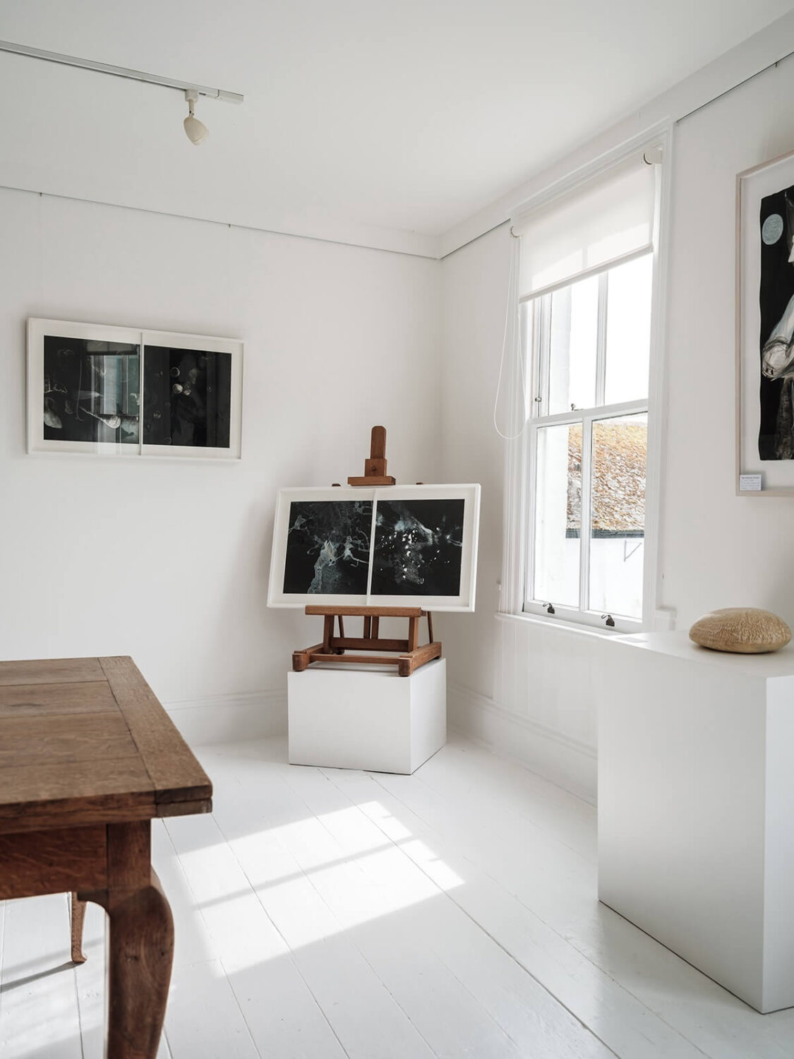 A Coastal White Painter's Home with Reclaimed Features in Cornwall 22 white art gallery