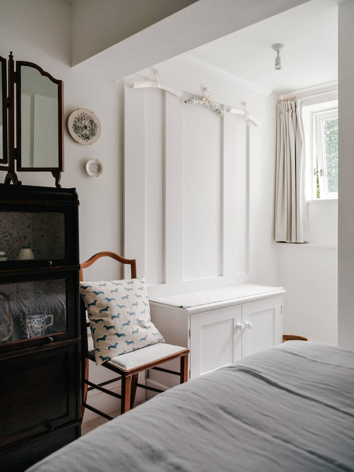 A Coastal White Painter's Home with Reclaimed Features in Cornwall 14 white bedroom with antique furniture