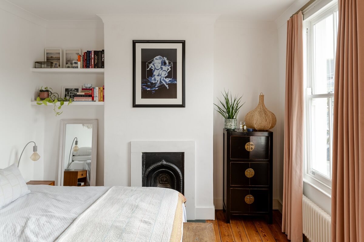 A Light London Family House with a Modern Extension 13 white bedroom with fireplace