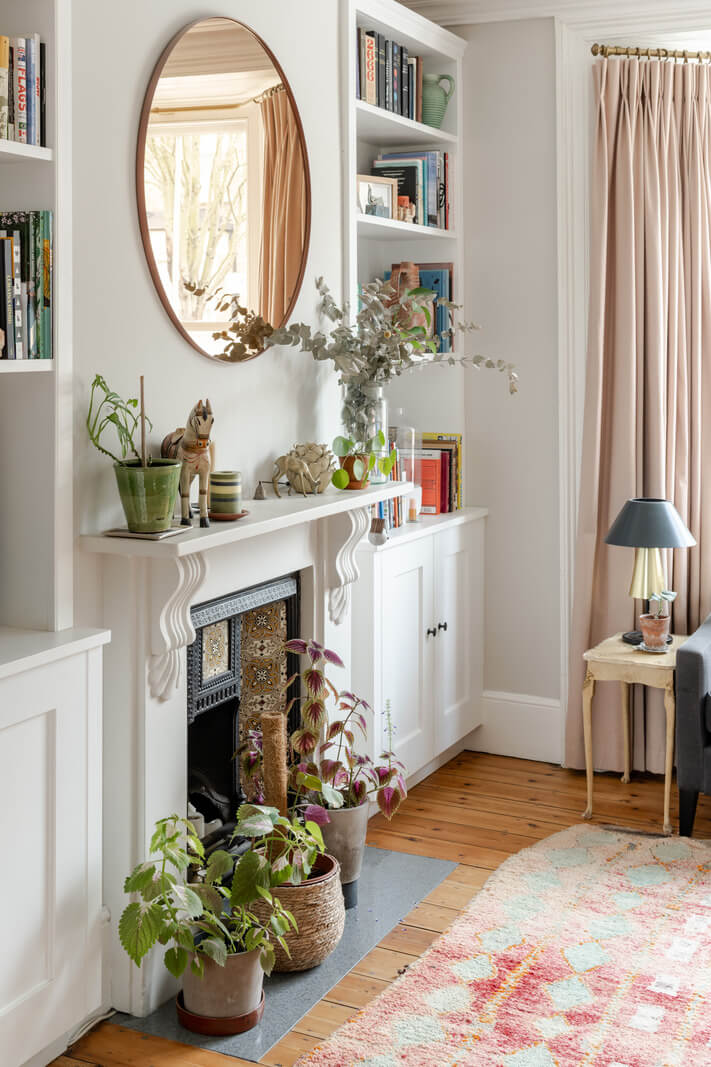 A Light London Family House with a Modern Extension 3 white fireplace