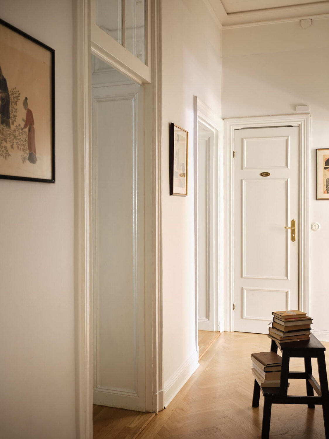 A Classic Stockholm Apartment with Floral Wallpaper 30 white hallway