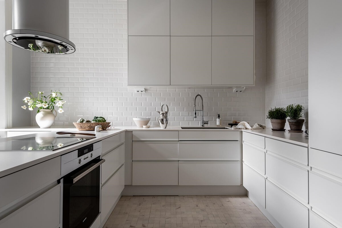 A Stylish Light Gray Swedish Apartment 10 white kitchen
