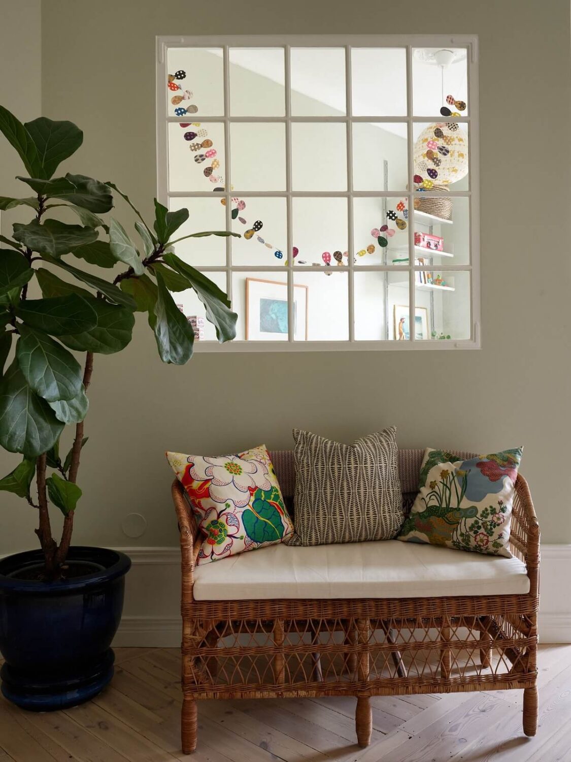 A Green Kitchen in a Gray Family Apartment 18 wicker bench