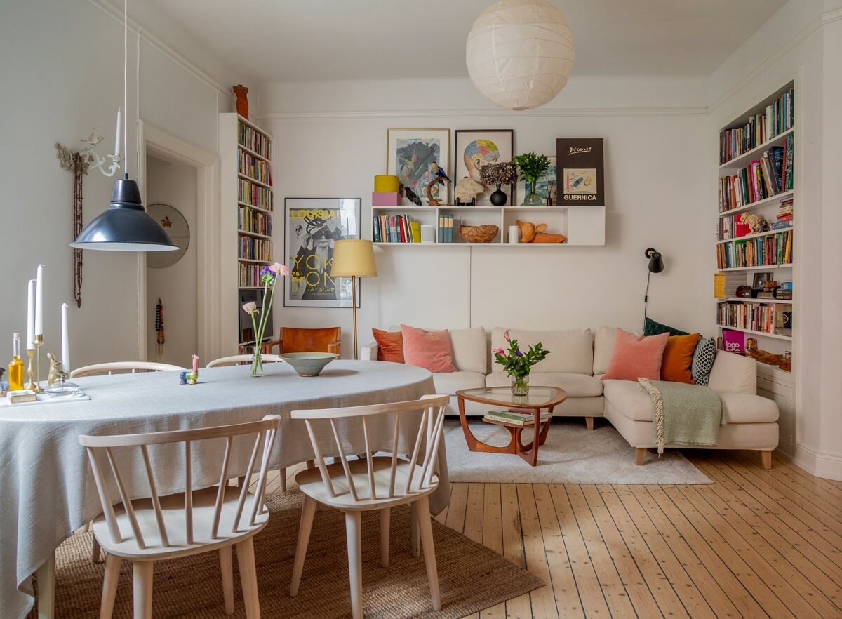 Period Details and Light Rooms in a Scandinavian Apartment 2 wooden floorboards living room with books