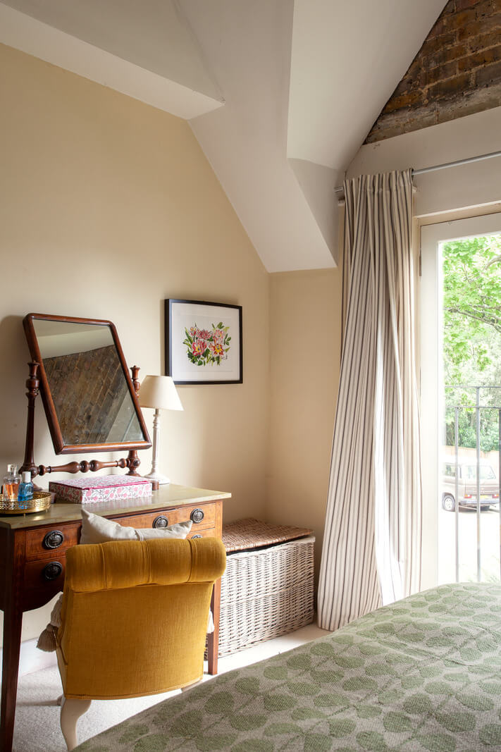 Charming Cottage Style in a London Maisonette 10 antique vanity table with ochre yellow chair