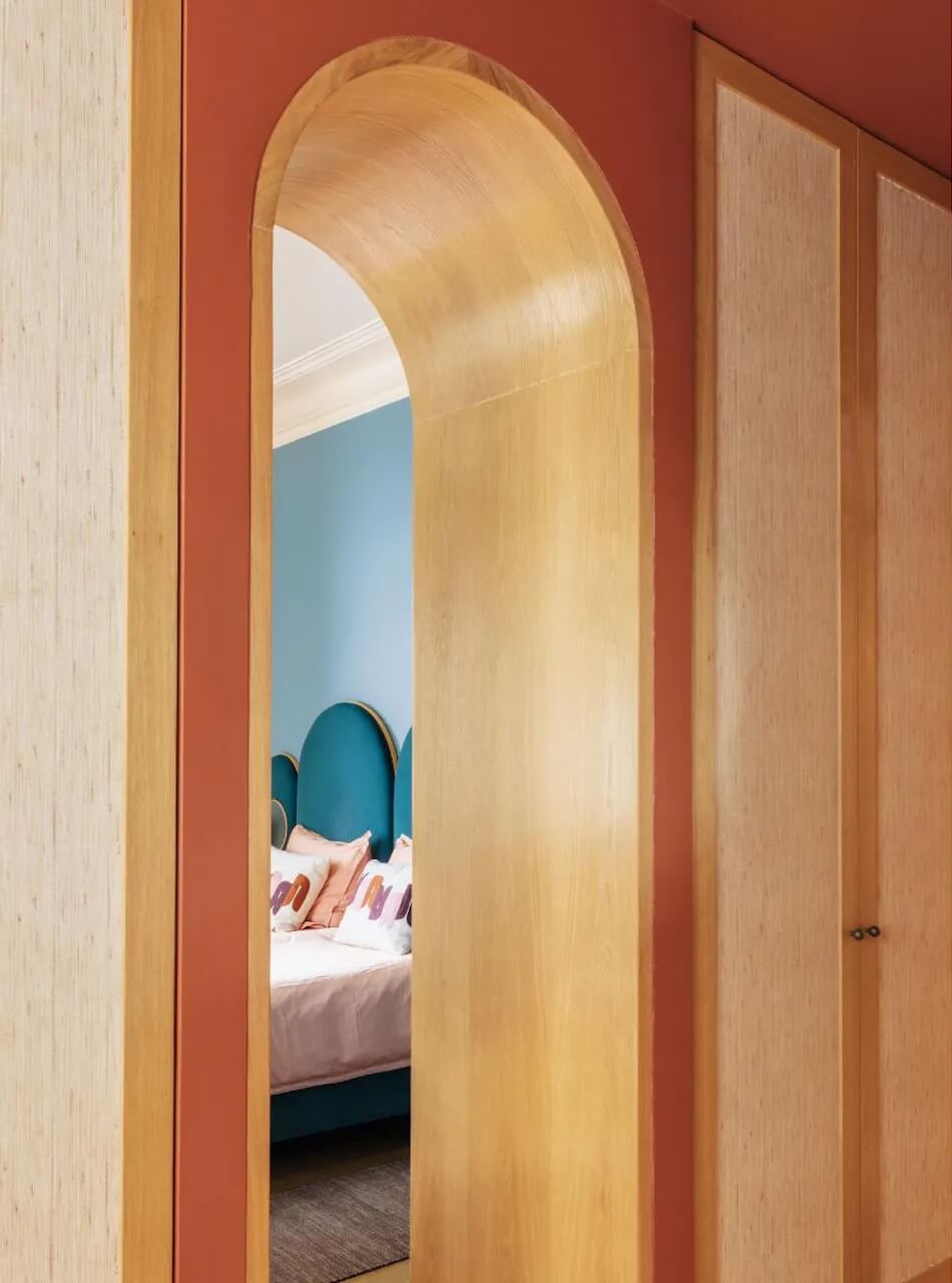 Color Touches in a Design Apartment in a Historic Villa 7 arched doorway blue bedroom nordroom