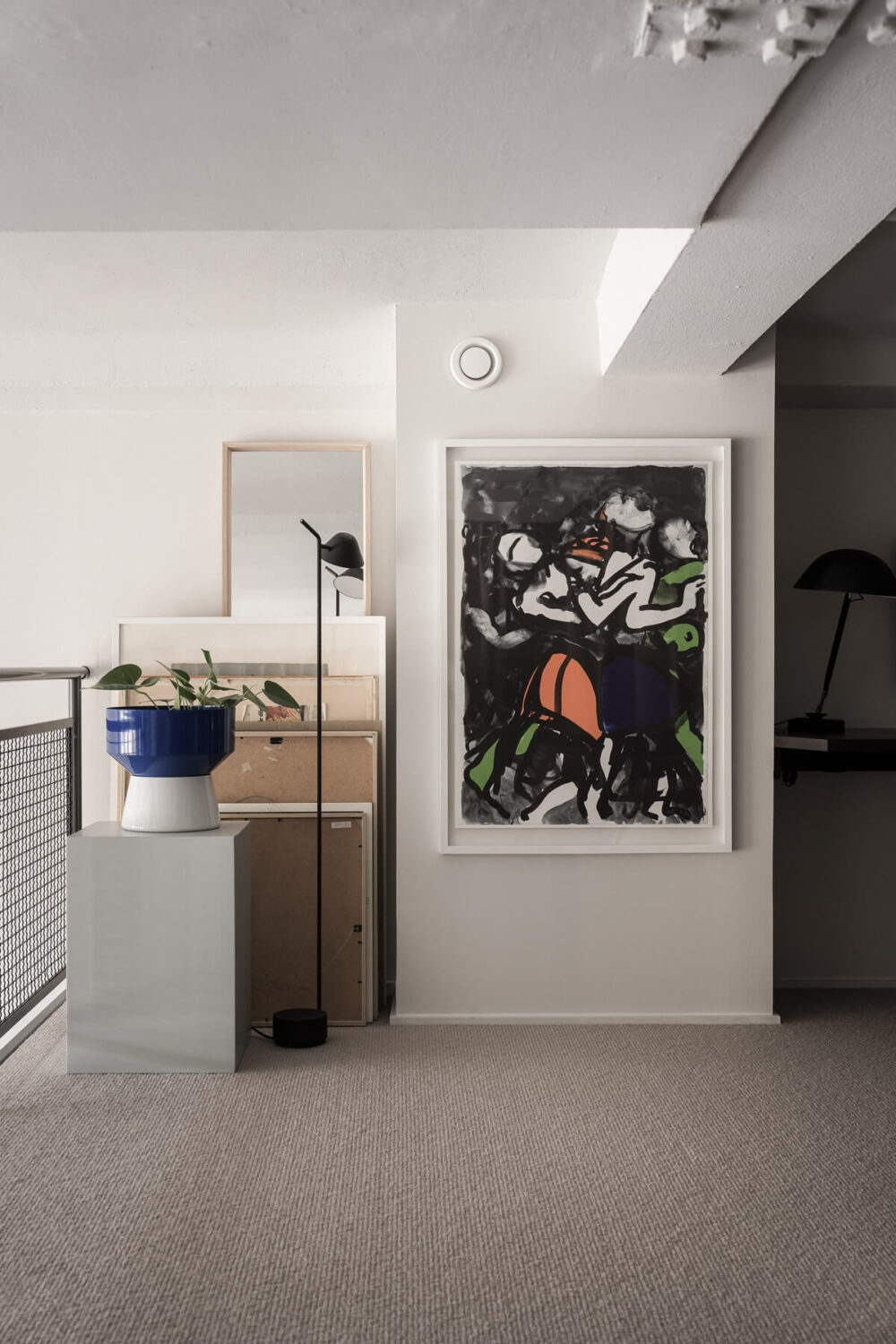 A Monochrome Loft with High Ceilings and Art 31 art in loft bedroom