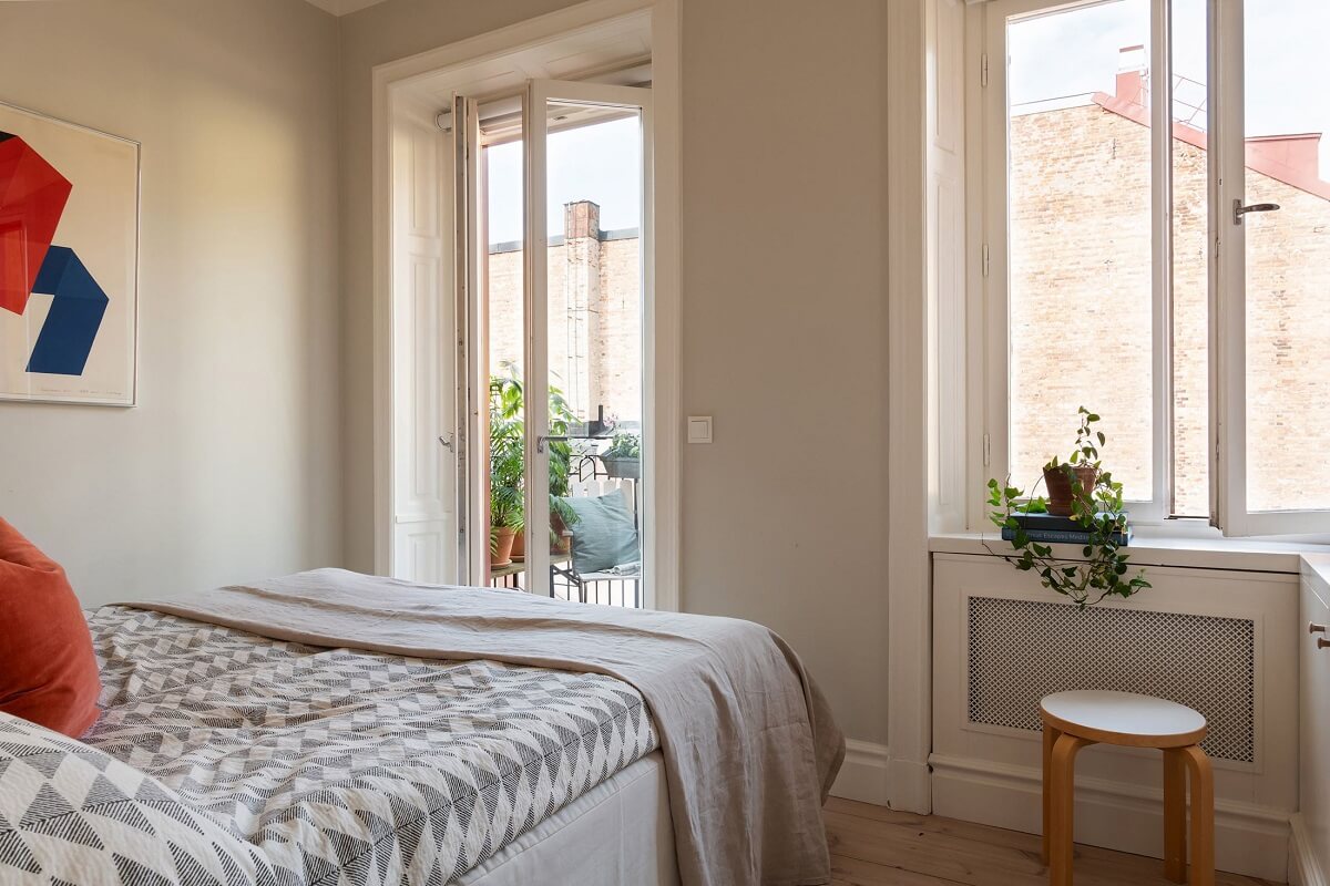 Light Rooms in a Renovated Historic Apartment in Stockholm 18 master bedroom with balcony nordroom