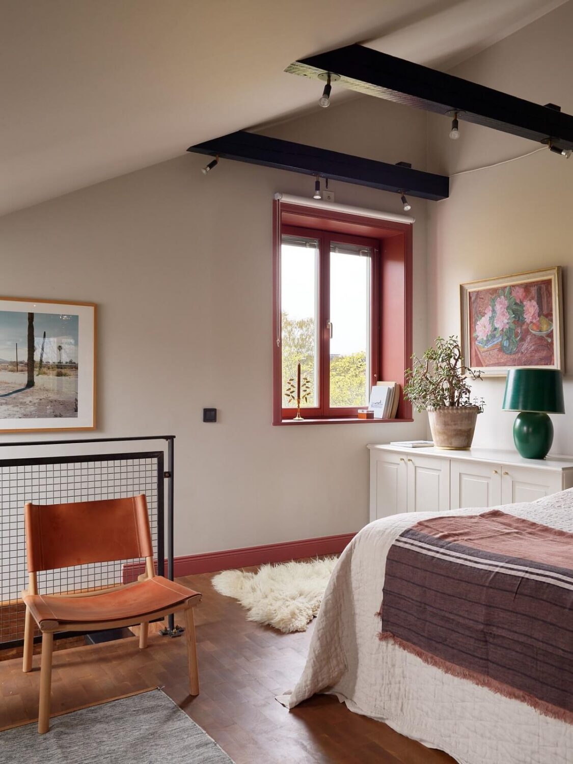 A Stunning Bathroom in a Duplex Apartment in Stockholm 18 attic bedroom with exposed beams nordroom