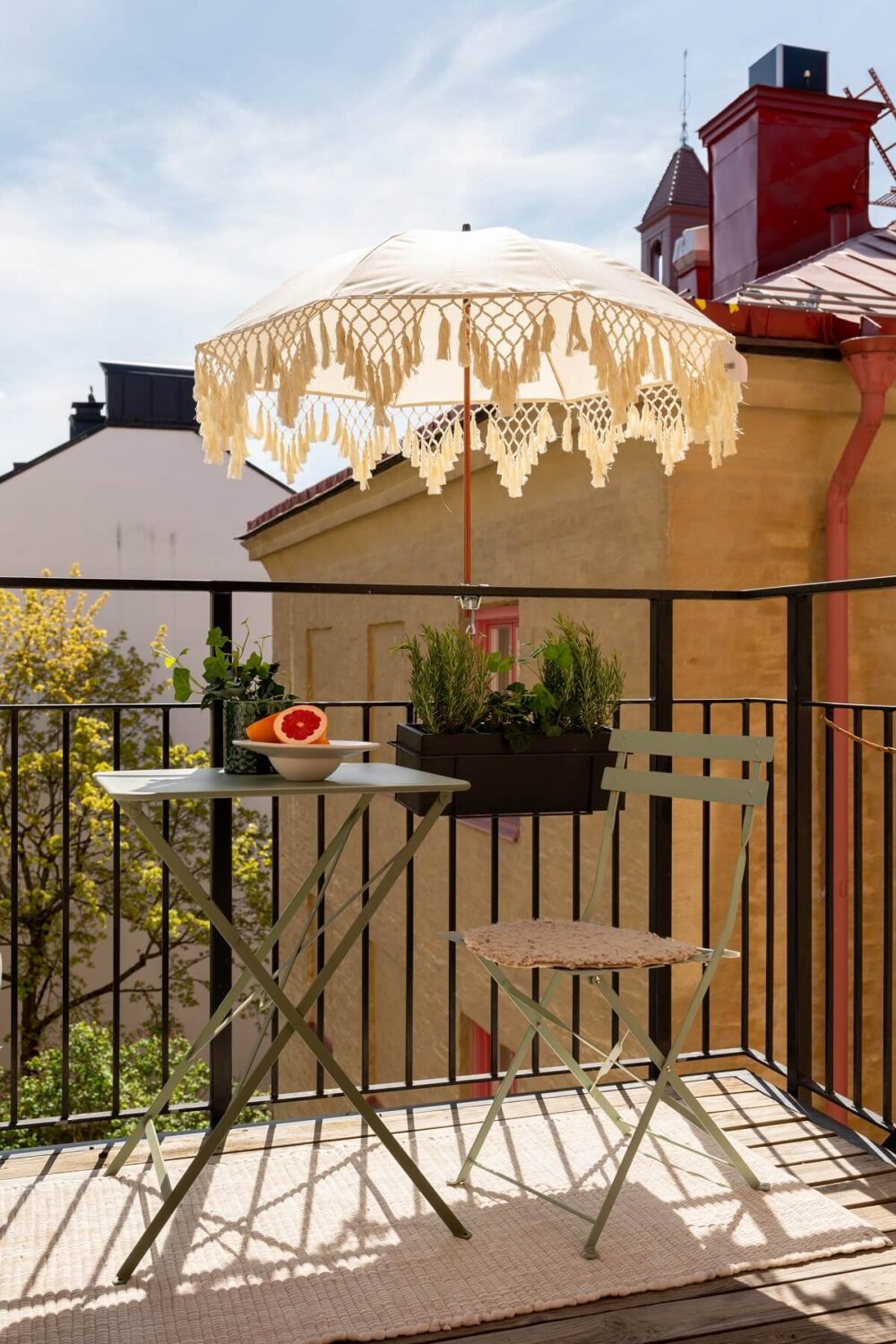 A Light Renovated Apartment in Stockholm 20 balcony with small table