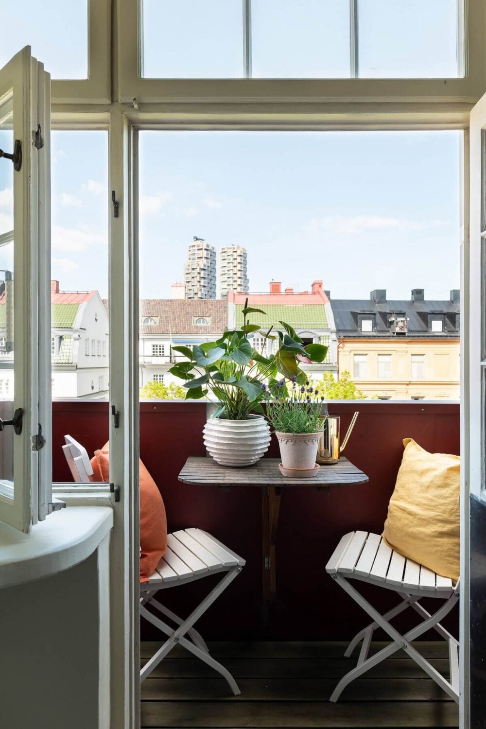 An Elegant Turn-of-the-Century Apartment in Stockholm 25 balcony with small table