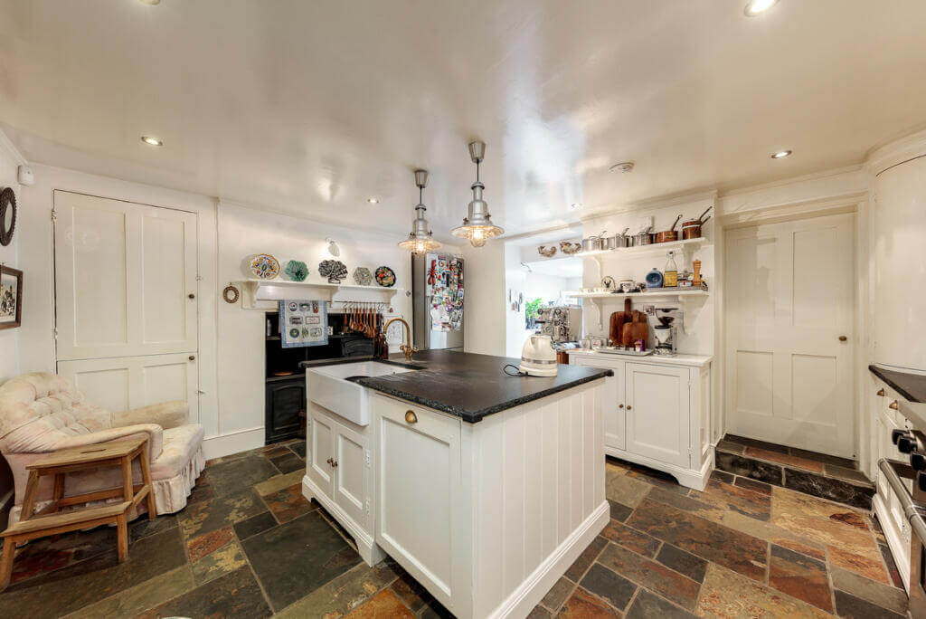 Unique Color Combinations and Design in a London Townhouse 11 basement kitchen with island