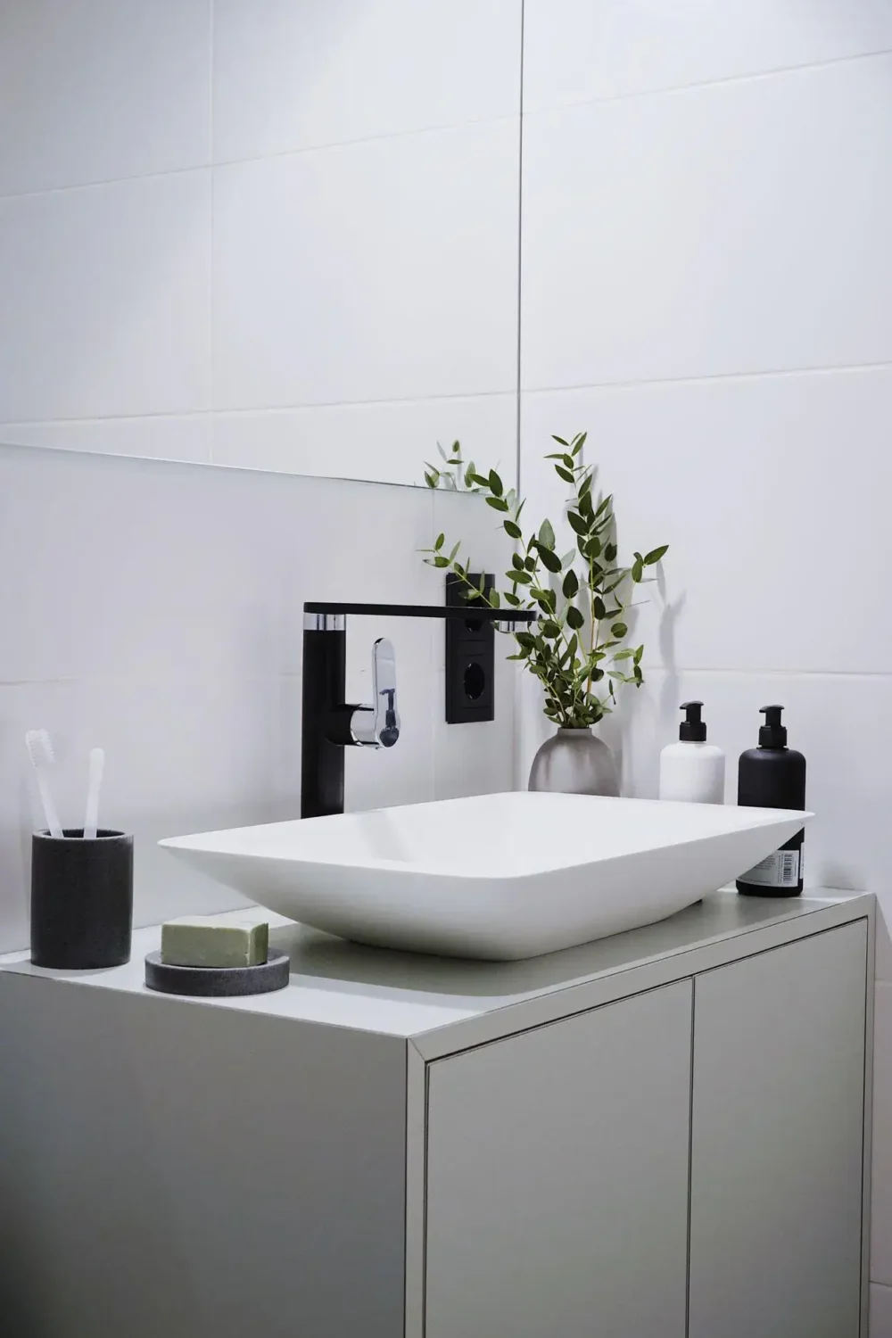 A Blue Kitchen in a Modern Design Apartment in Berlin 9 bathroom with black fittings