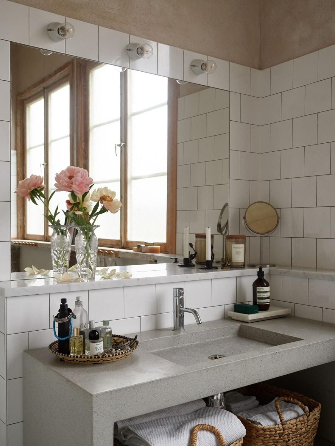 A Charming School Conversion in Sweden 17 bathroom with concrete sink