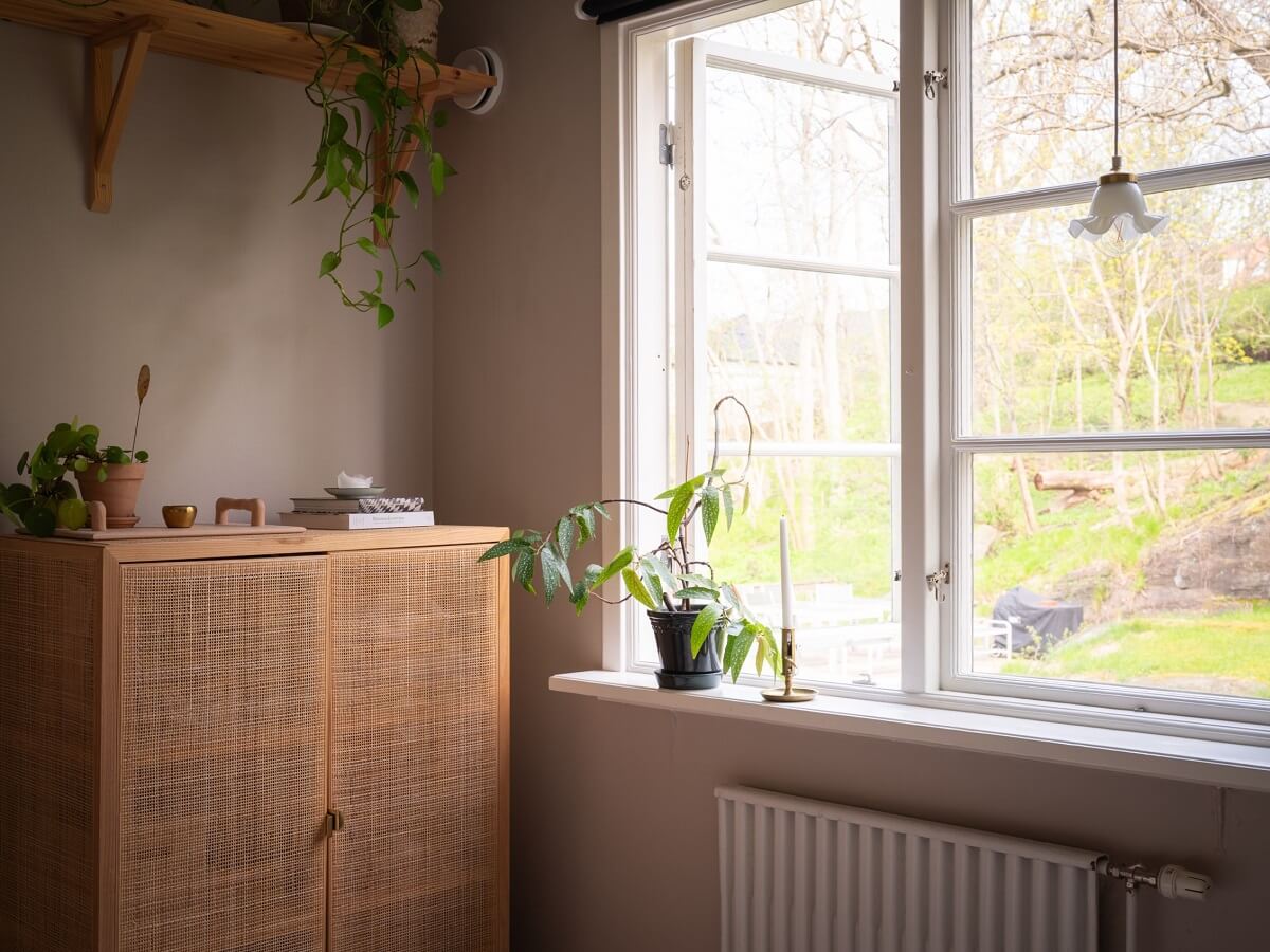 Warm Orange Tones in a Small Apartment 13 bedorom ikea cabinet