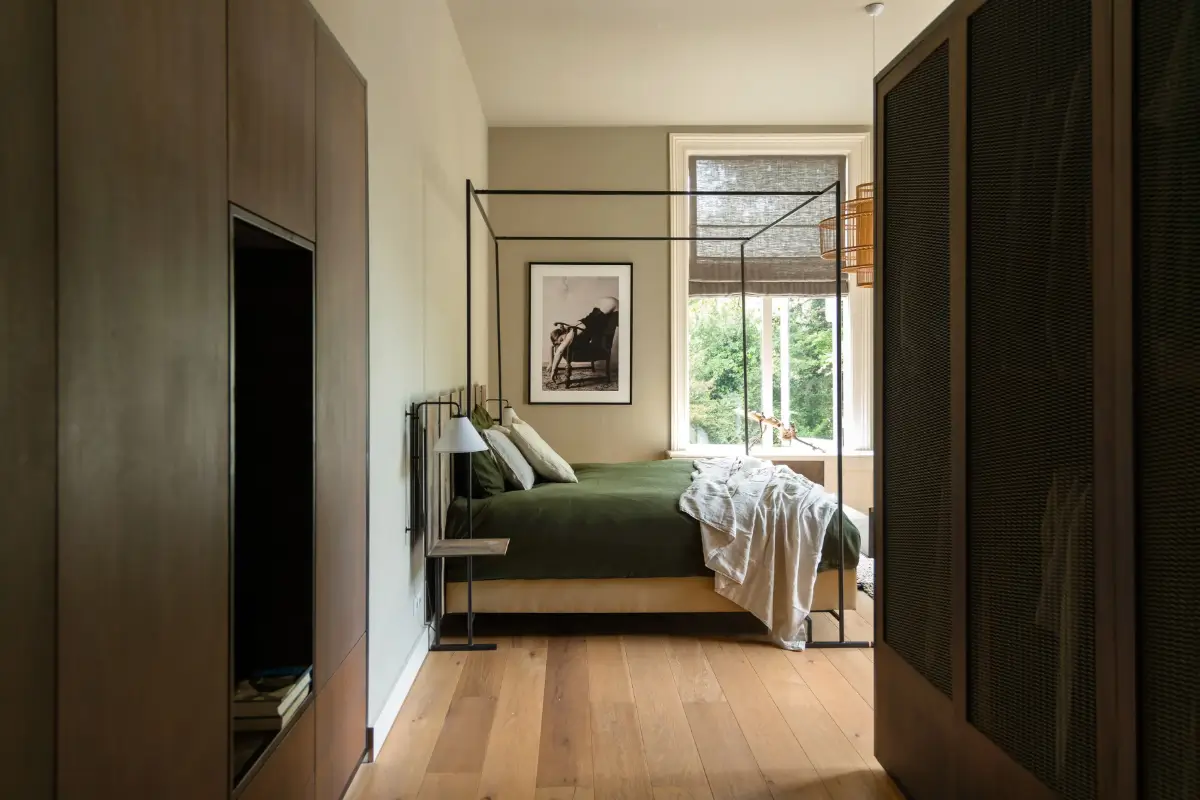 A Warm Atmosphere in a Historic Dutch Villa 18 bedroom-canopy-bed