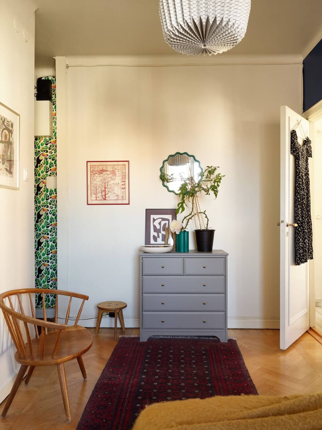 A Vintage Apartment with a Vibrant Blue Bedroom 14 bedroom dresser