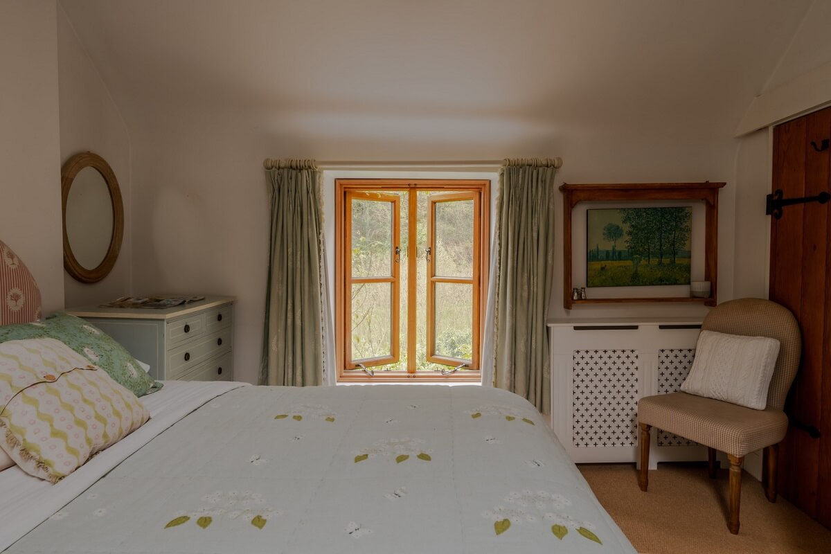 Ochre Yellow and Green Tones in a Cozy Welsh Cottage 19 bedroom low ceiling