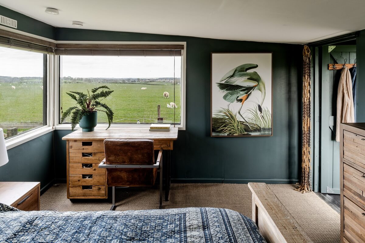 A Tiny Off-Grid House in the English Countryside 16 bedroom-with-desk-countryside-views-nordroom