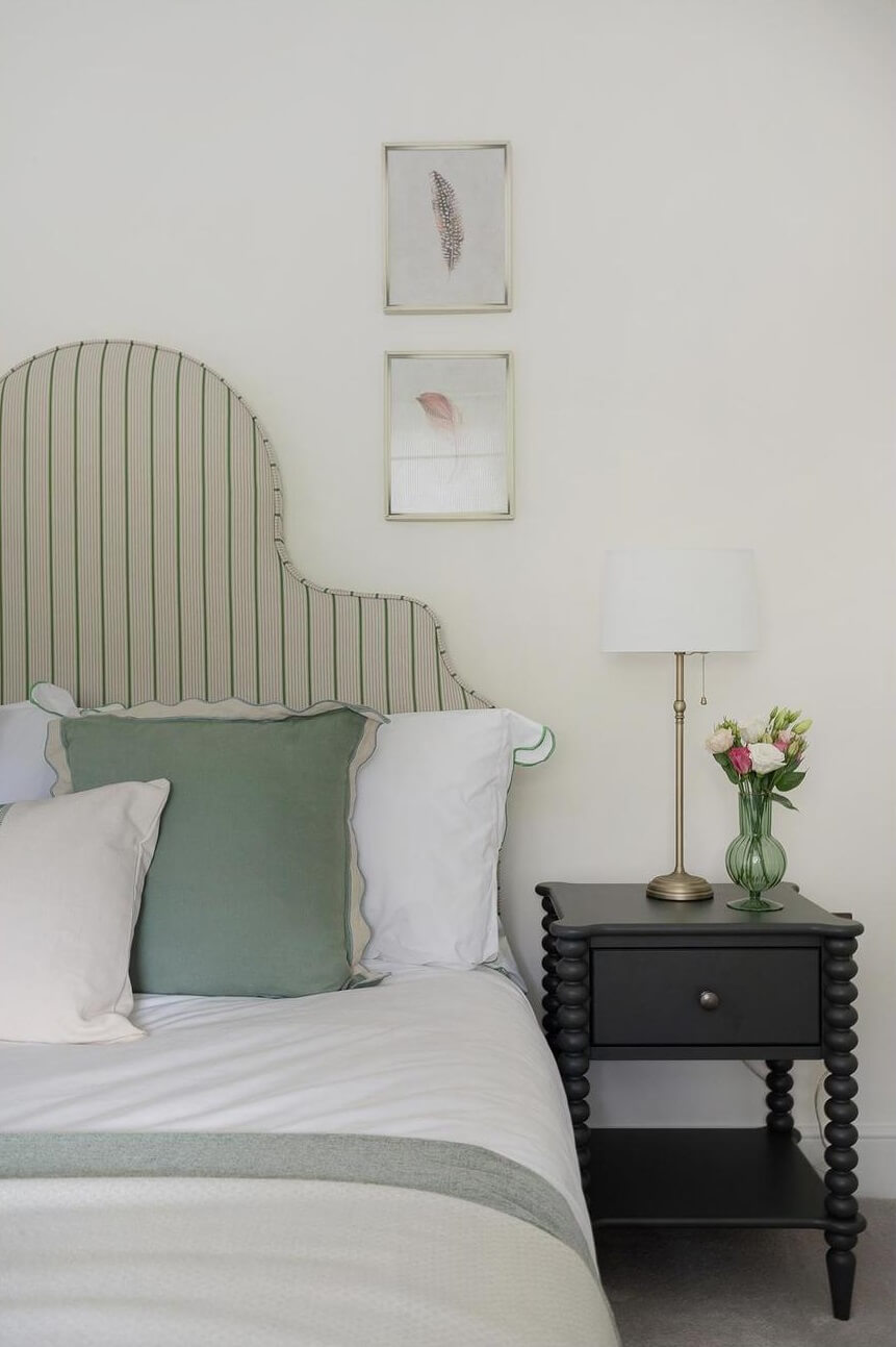 A Victorian House with a Blue deVOL Kitchen 18 bedroom with muted green accents