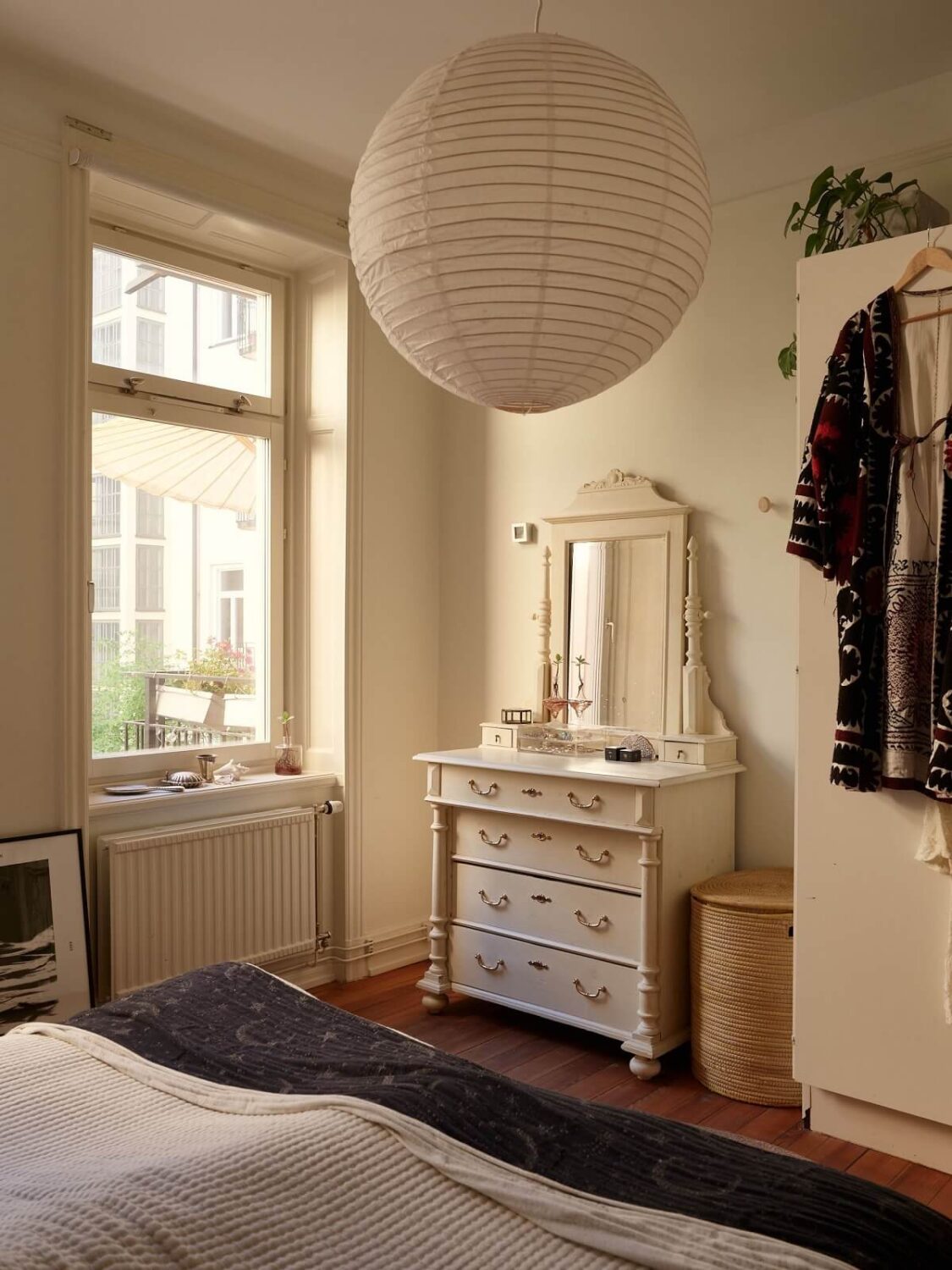 Warm Tones and a Blue Hallway in a Stockholm Apartment 14 bedroom with vintage vanity table