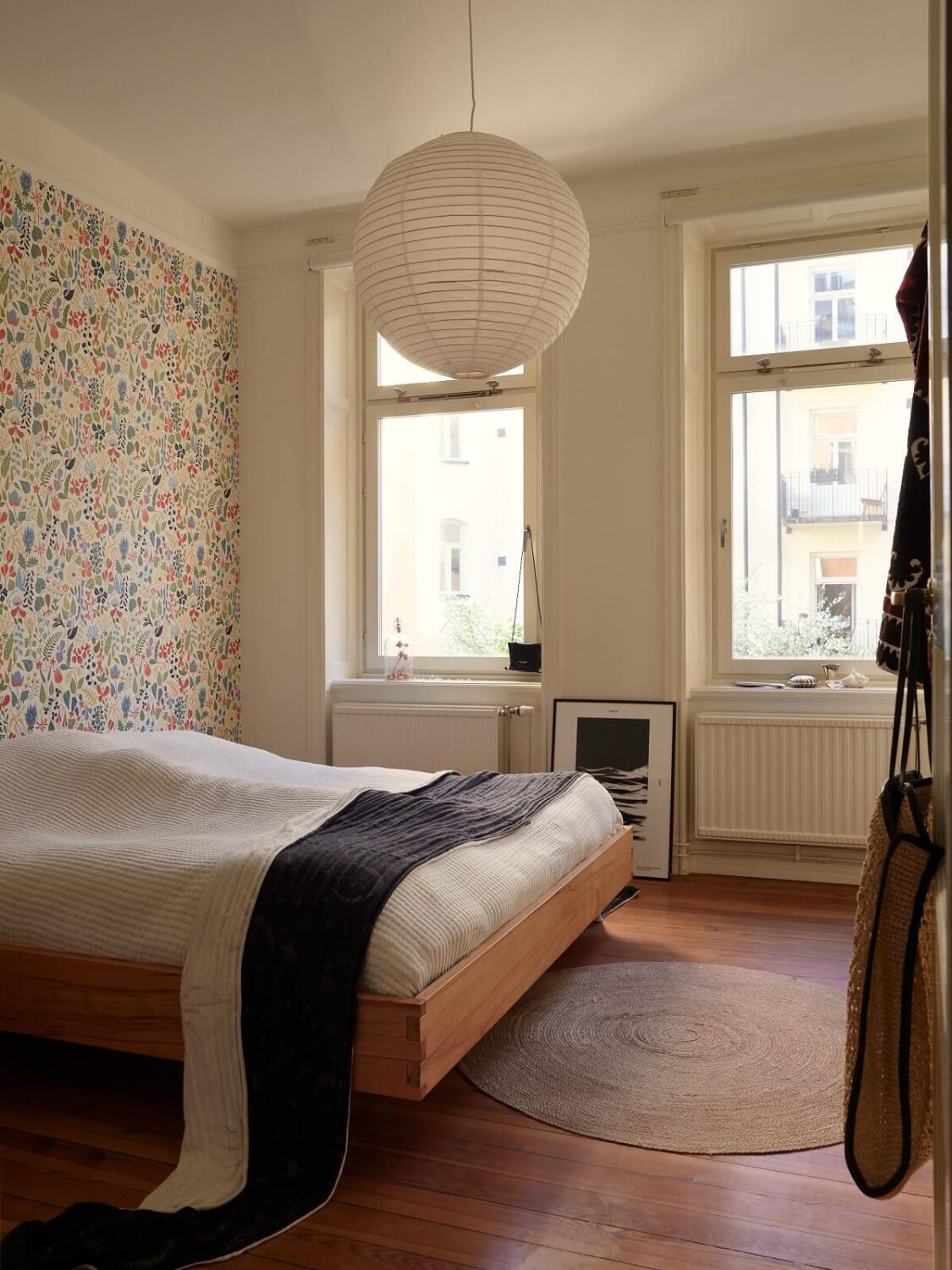 Warm Tones and a Blue Hallway in a Stockholm Apartment 13 bedroom with wallpaper