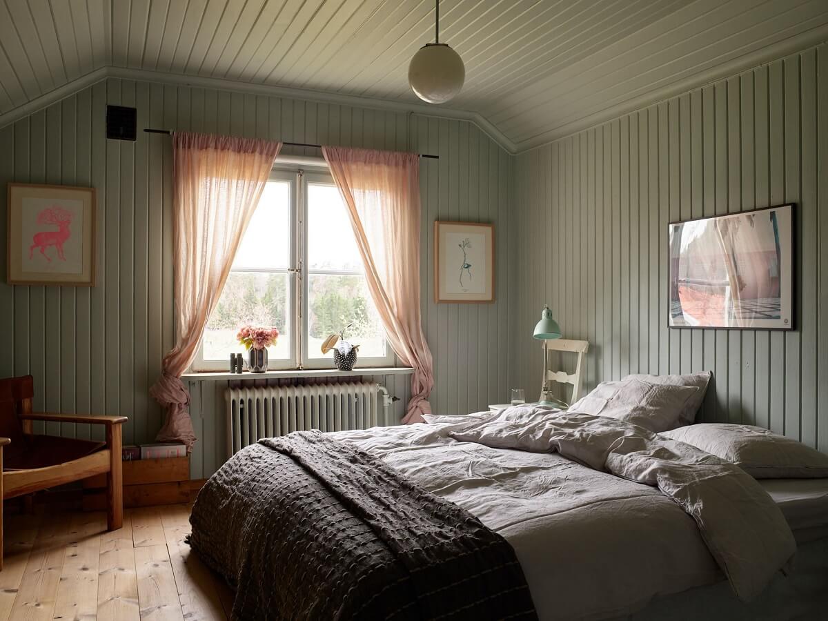 A Charming School Conversion in Sweden 19 bedroom with wooden walls