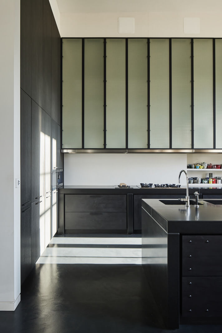 A Monochrome London Loft Filled with Art 12 black kitchen monochrome loft apartment london nordroom