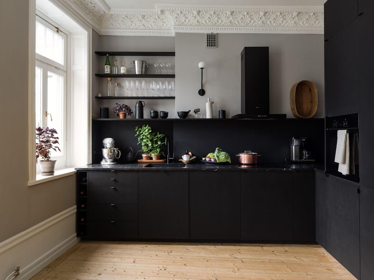 A Gray Stockholm Apartment with a Black Kitchen 5 black kitchen with shelves and gray walls nordroom