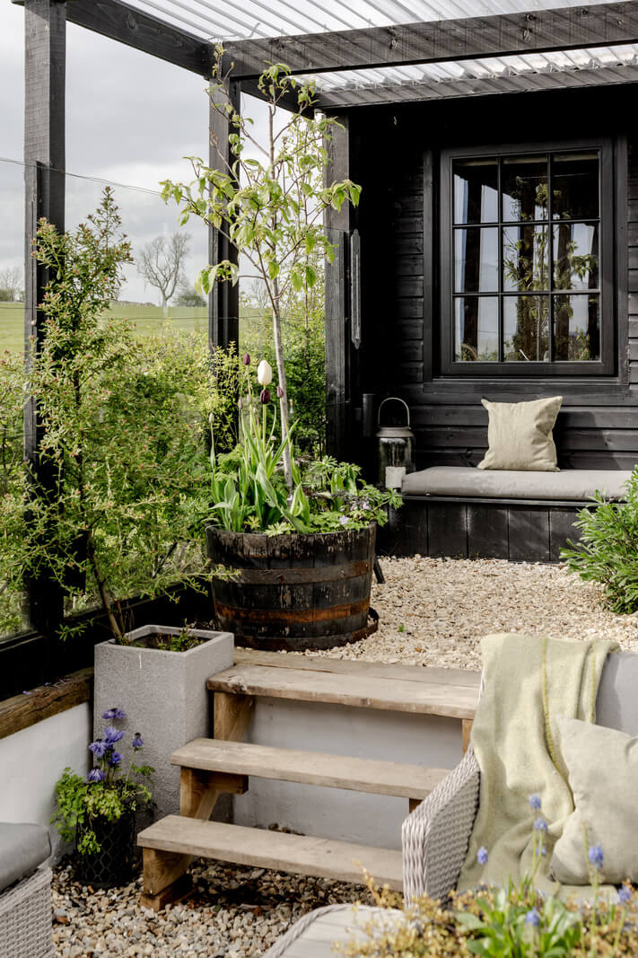A Tiny Off-Grid House in the English Countryside 14 black-shed-garden-nordroom