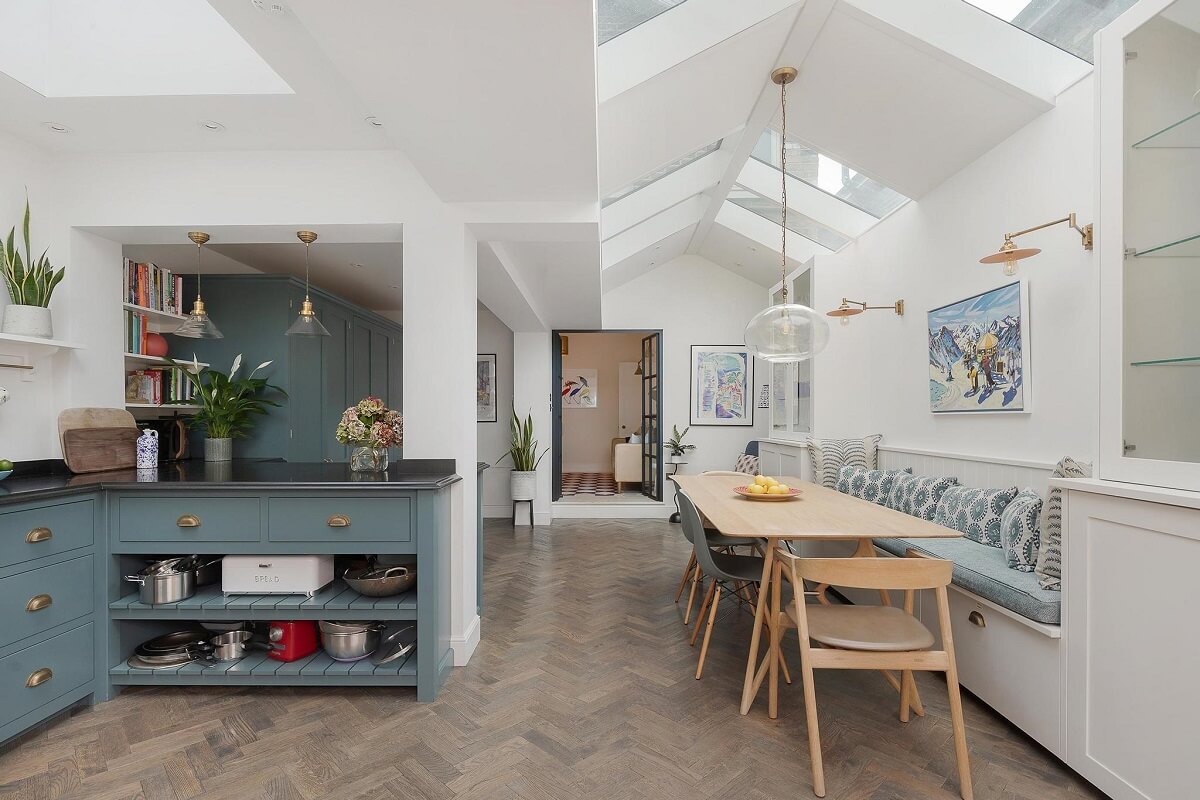 A Victorian House with a Blue deVOL Kitchen 4 blue devol kitchen with dining table and skylights