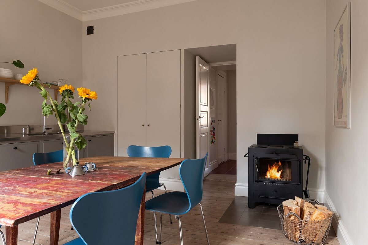 Light Rooms in a Renovated Historic Apartment in Stockholm 11 blue dining chairs