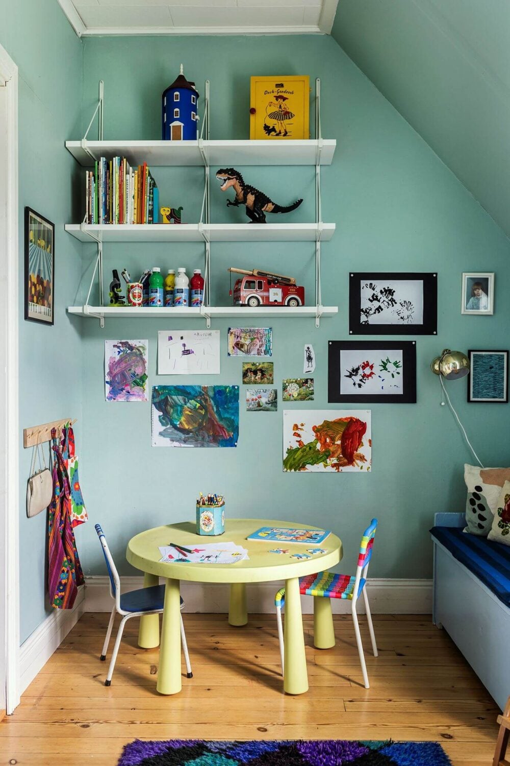 A Historic Swedish Country House with a Beautiful Garden 21 blue green kids bedroom with shelves