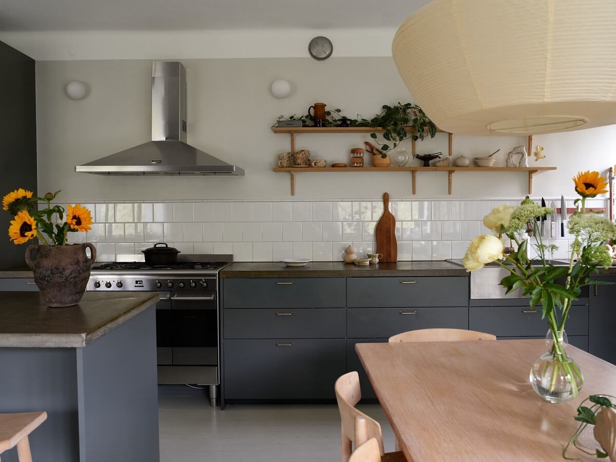 A Stunning Bathroom in a Duplex Apartment in Stockholm 9 blue kitchen cabinets and white tiles
