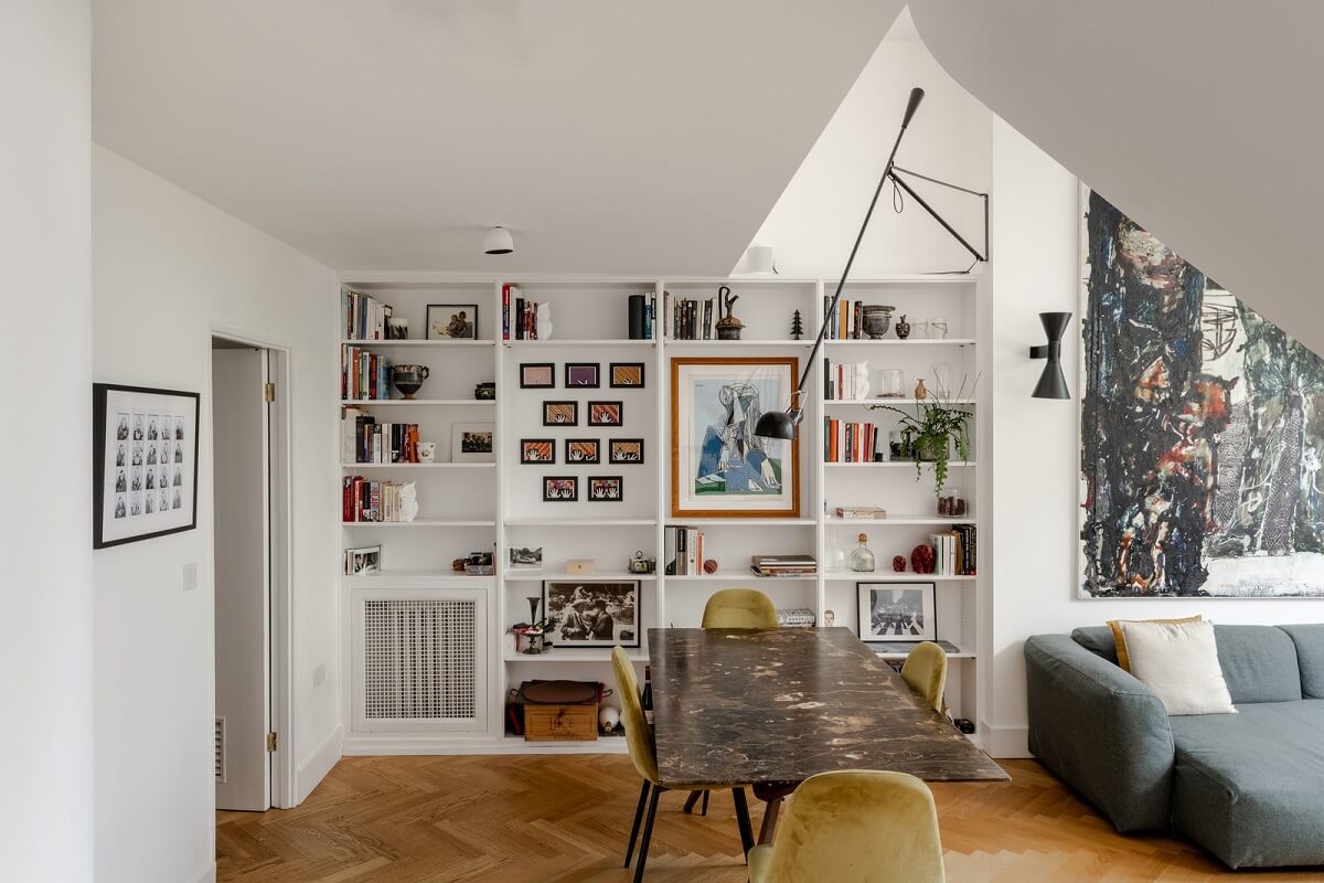 High Ceilings in a Light London Apartment 6 built in bookshelves dining room