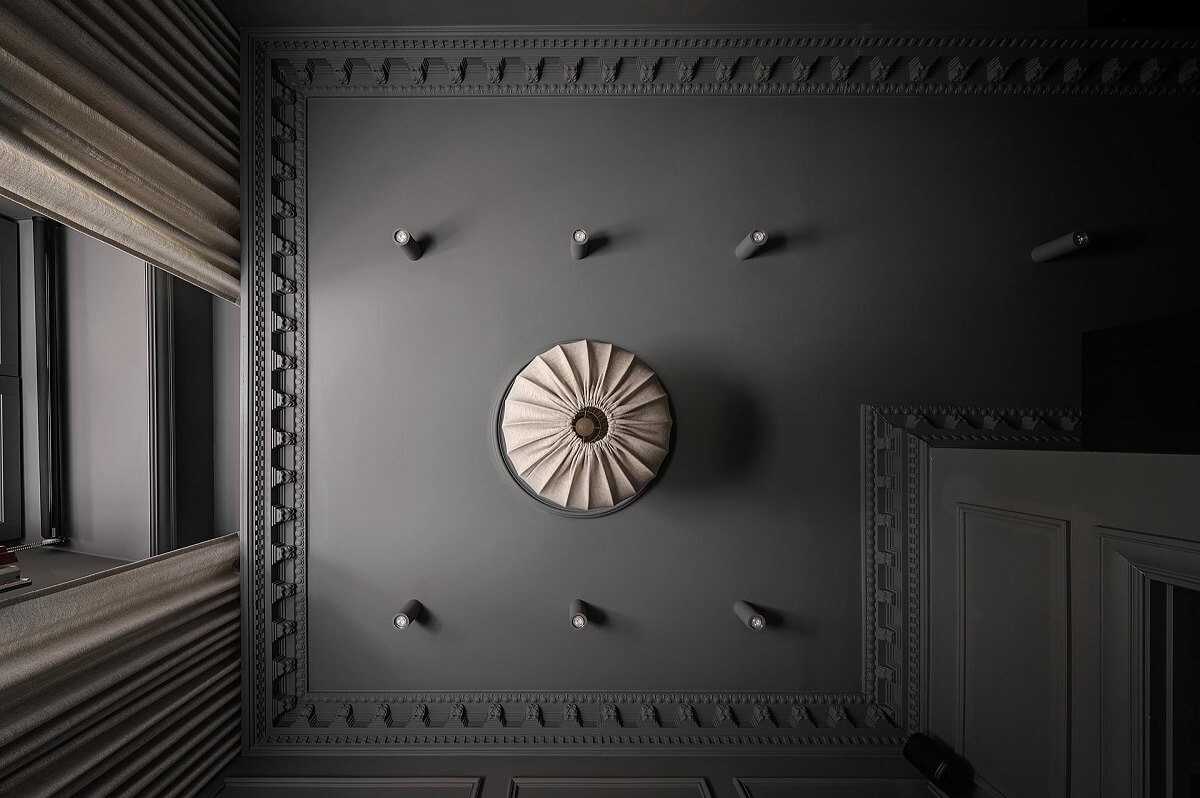A Luxurious Renovated Apartment with Dark Gray Walls 24 ceiling ornaments