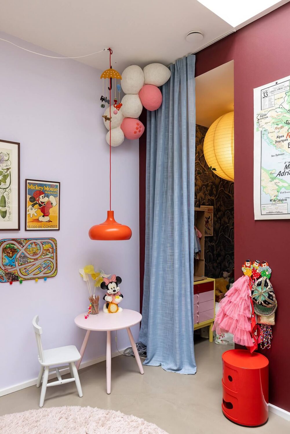 A Unique Basement Apartment in Stockholm 21 children room with bed nook hidden behind blue curtain nordroom