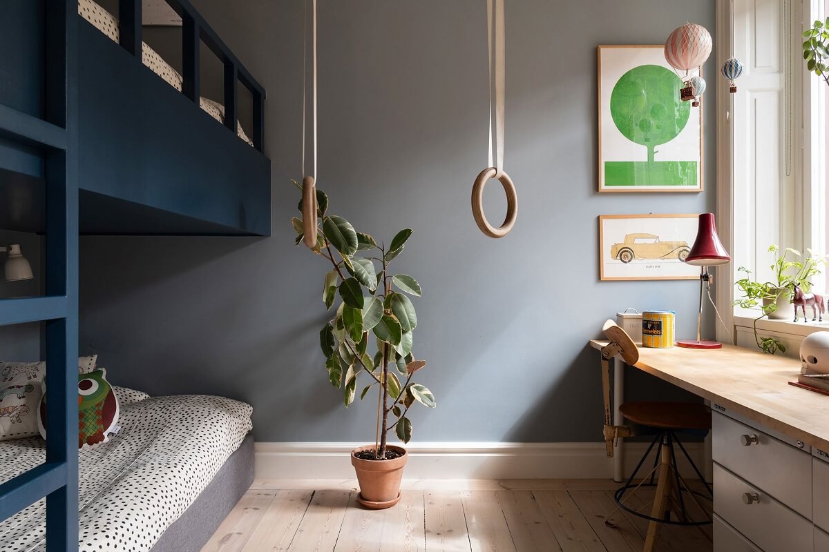 Light Rooms in a Renovated Historic Apartment in Stockholm 13 children room with gray walls desk and blue bunk bed nordroom
