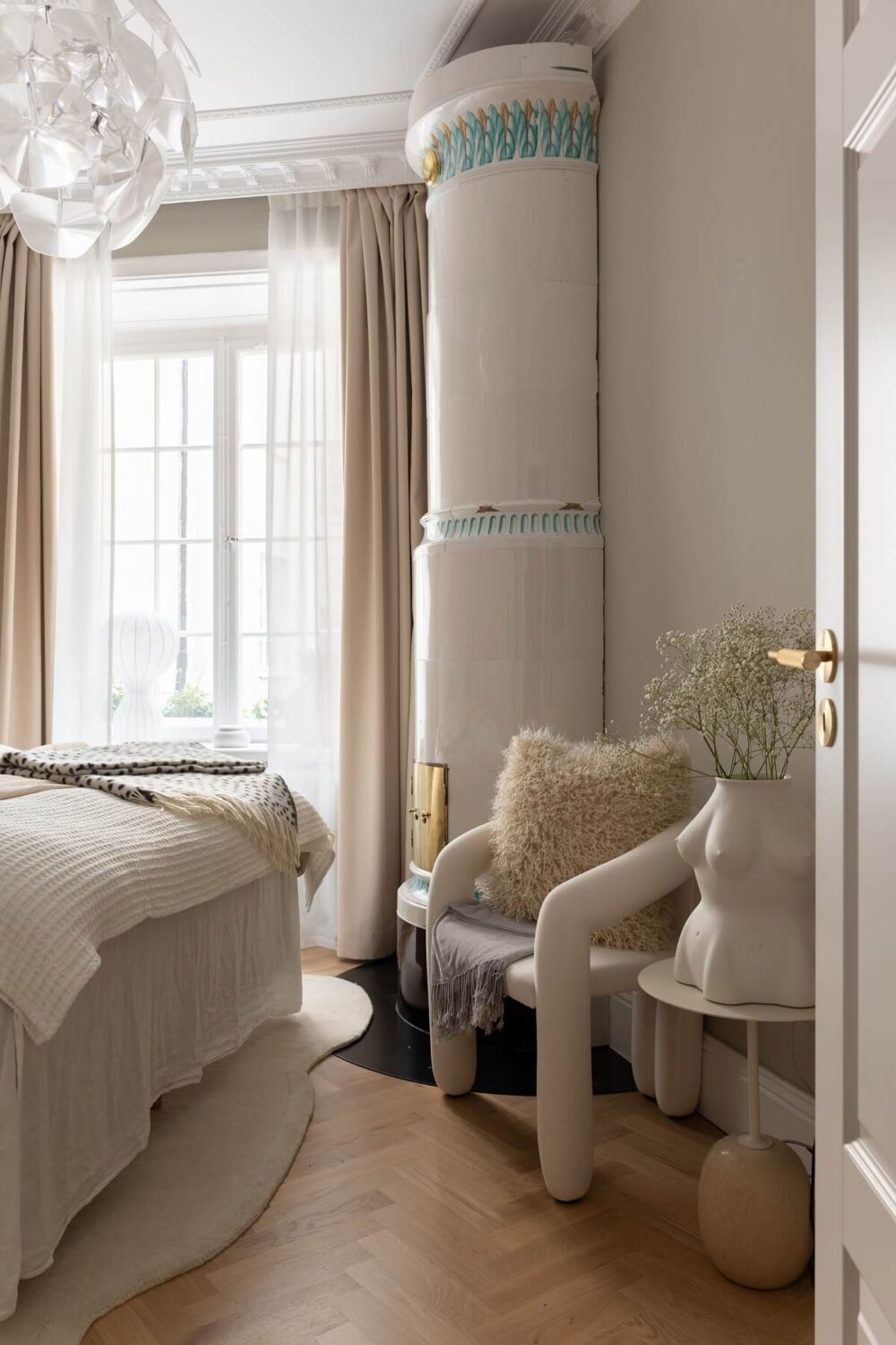 A Classic Look for a Swedish Apartment 13 classic bedroom with fireplace and light gray walls nordroom