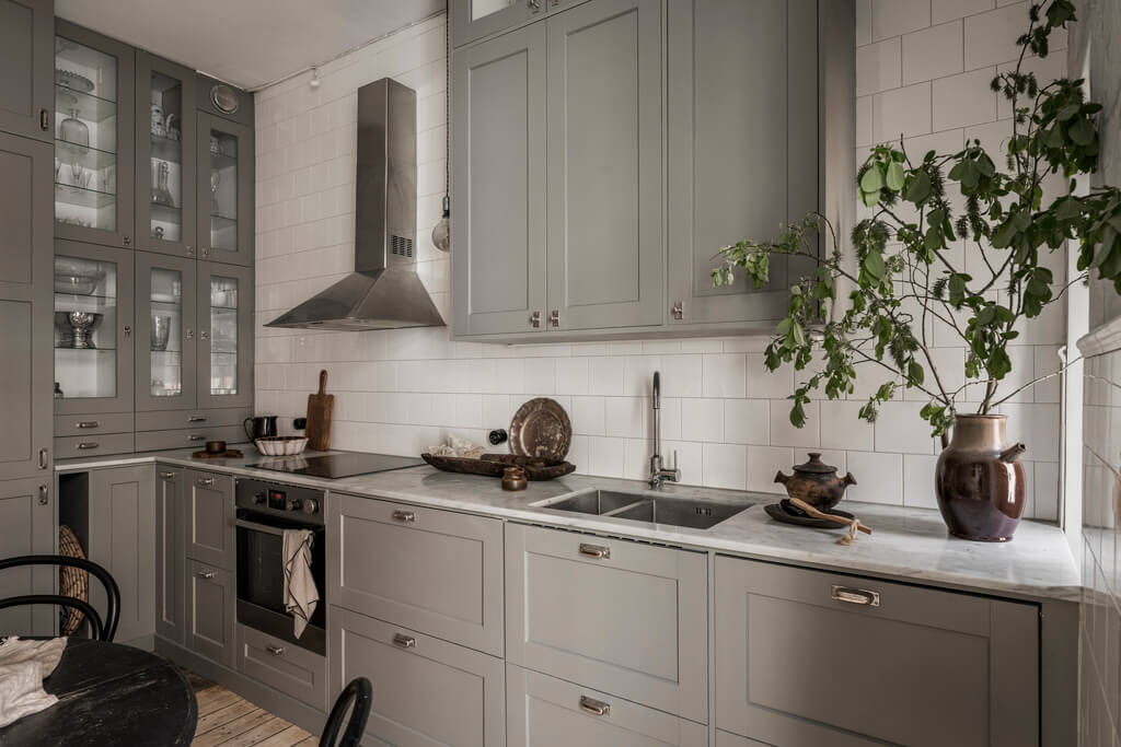 Wallpaper and Historic Charm in a Swedish Apartment 20 classic gray kitchen