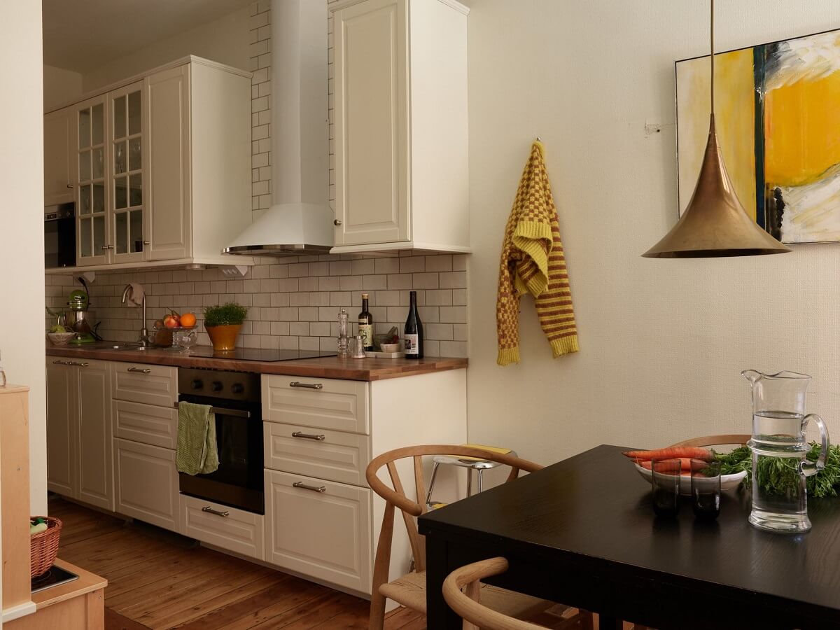 Warm Tones and a Blue Hallway in a Stockholm Apartment 9 classic kitchen