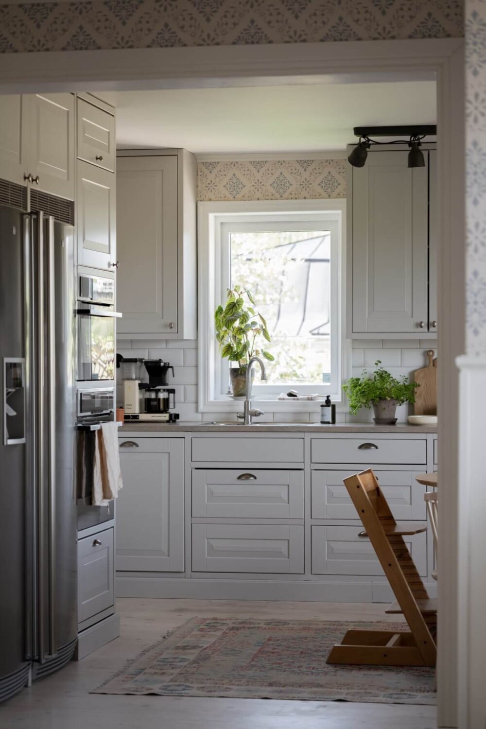 A Pink Swedish House with a Lovely Garden 9 classic light gray kitchen