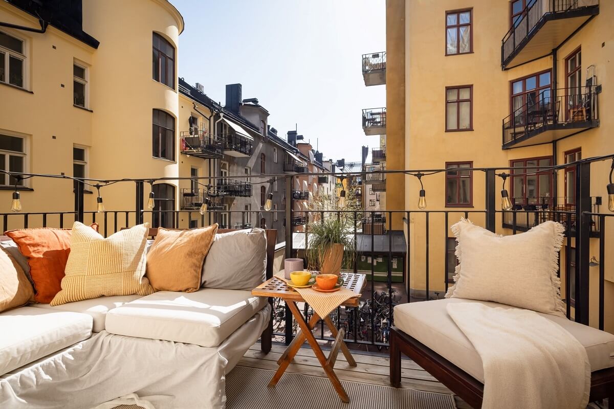 Warm Color Tones in a Scandinavian Apartment 14 courtyard balcony