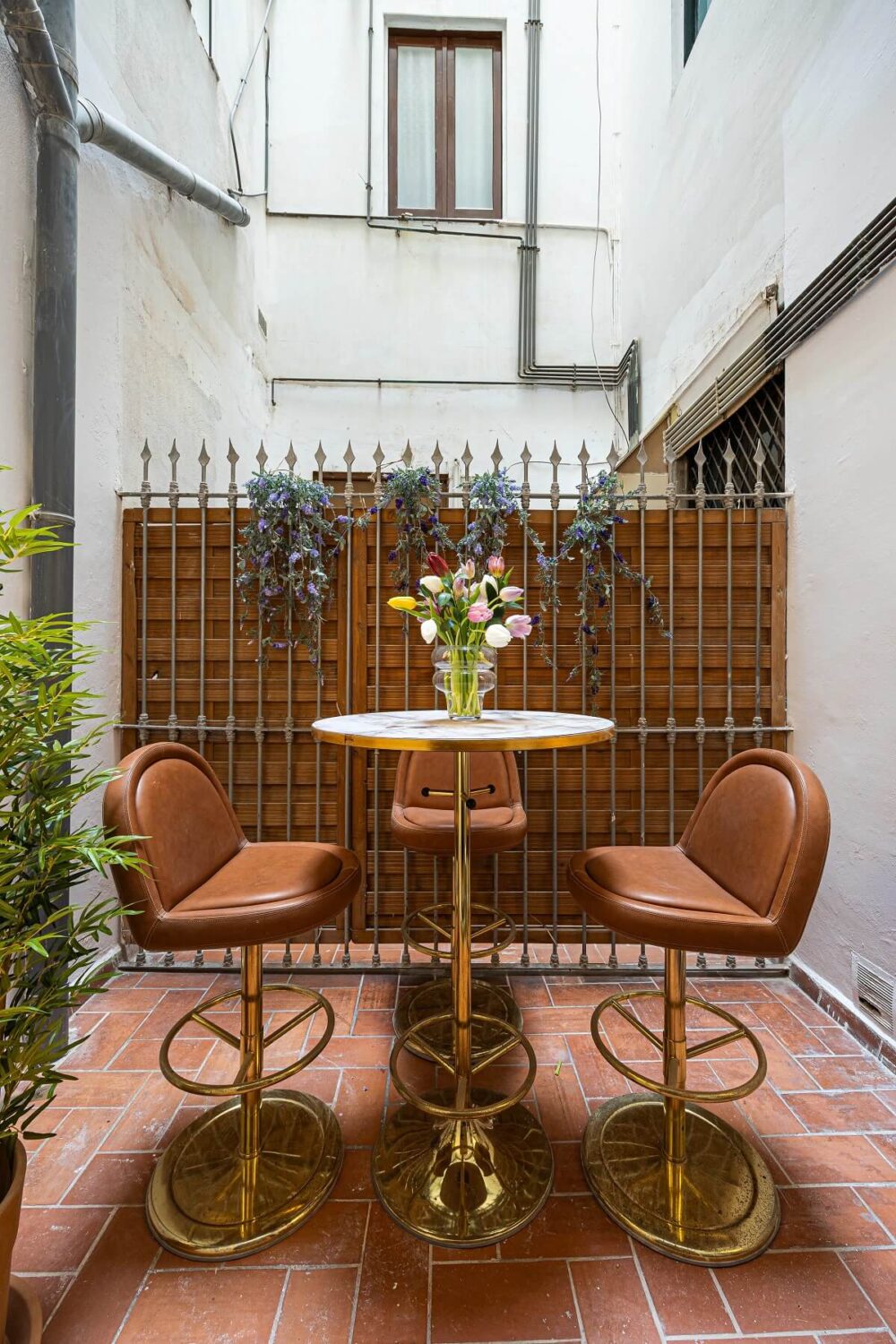 A Renovated Modernist Apartment in Barcelona 11 courtyard garden