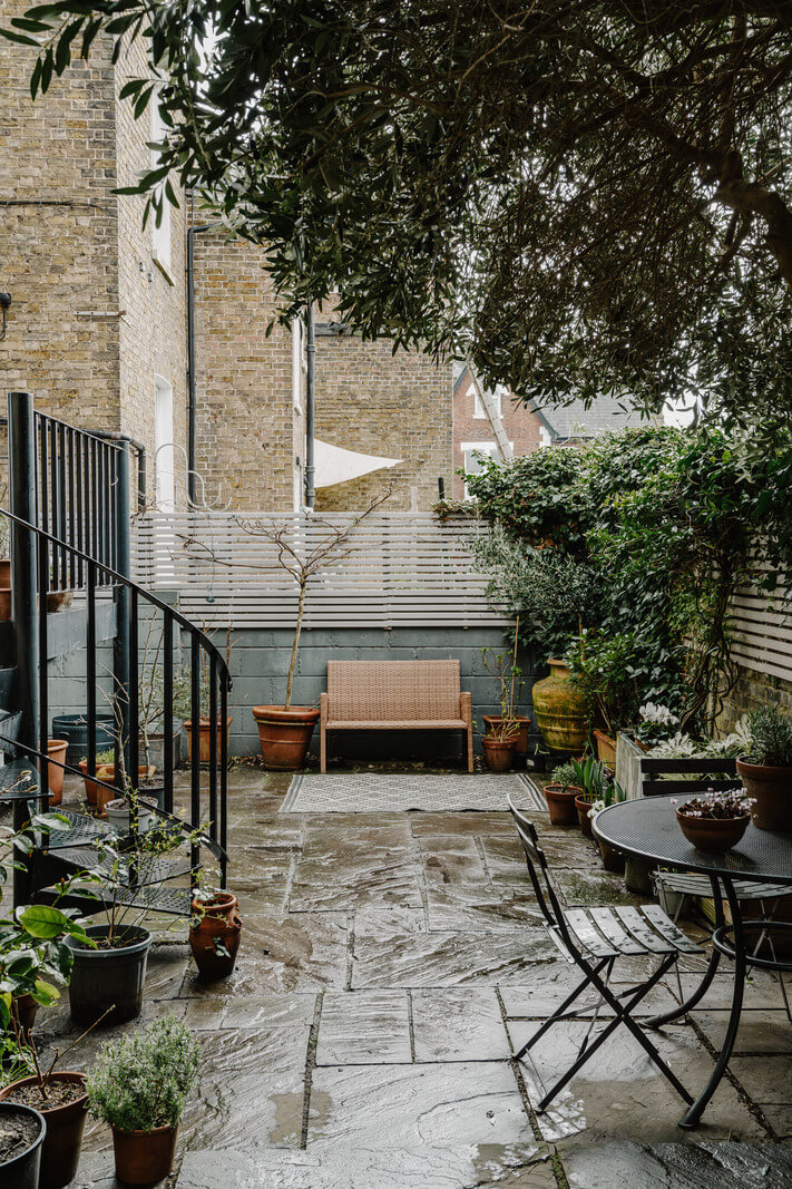 Neutral Tones and Original Features in an English Townhouse 17 courtyard garden with seating