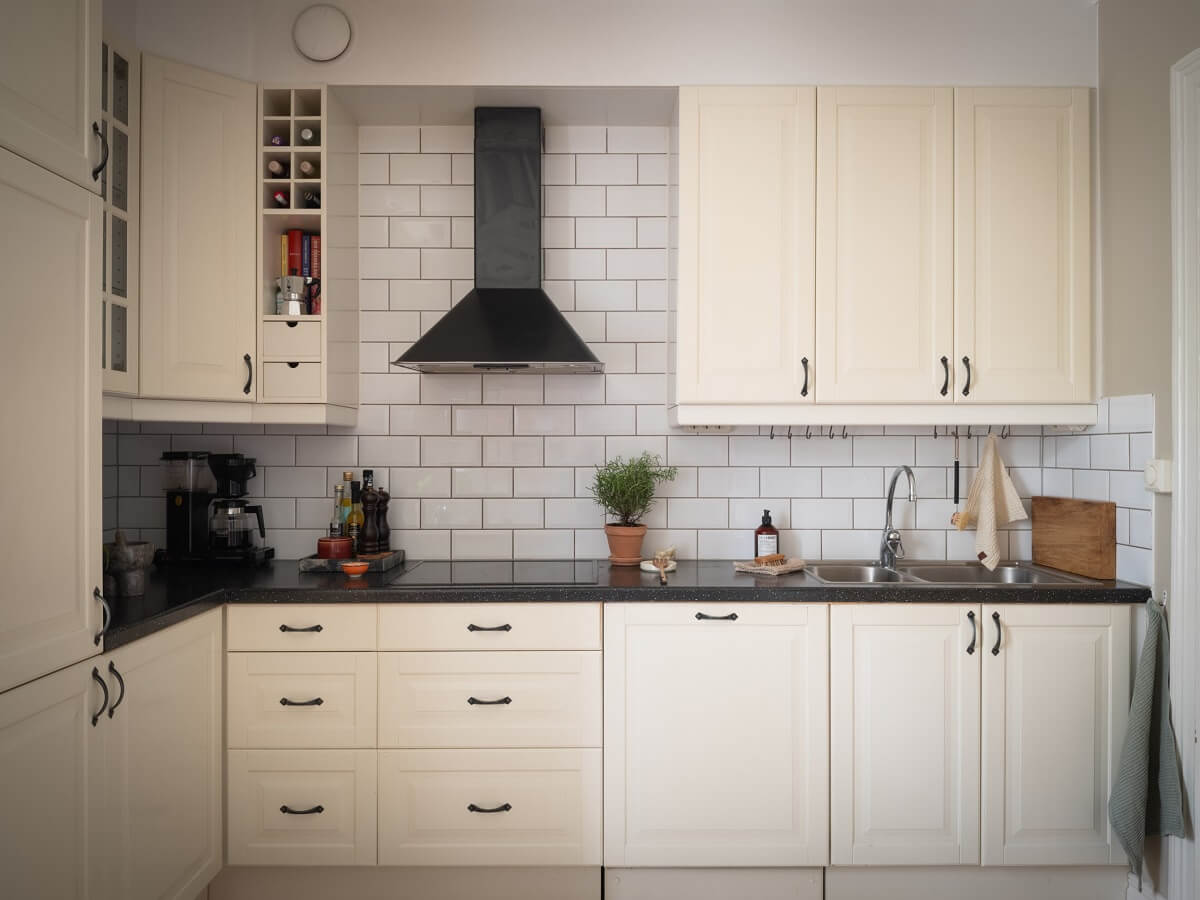 Original Details in a Light-Filled Swedish Apartment 9 cream colored kitchen