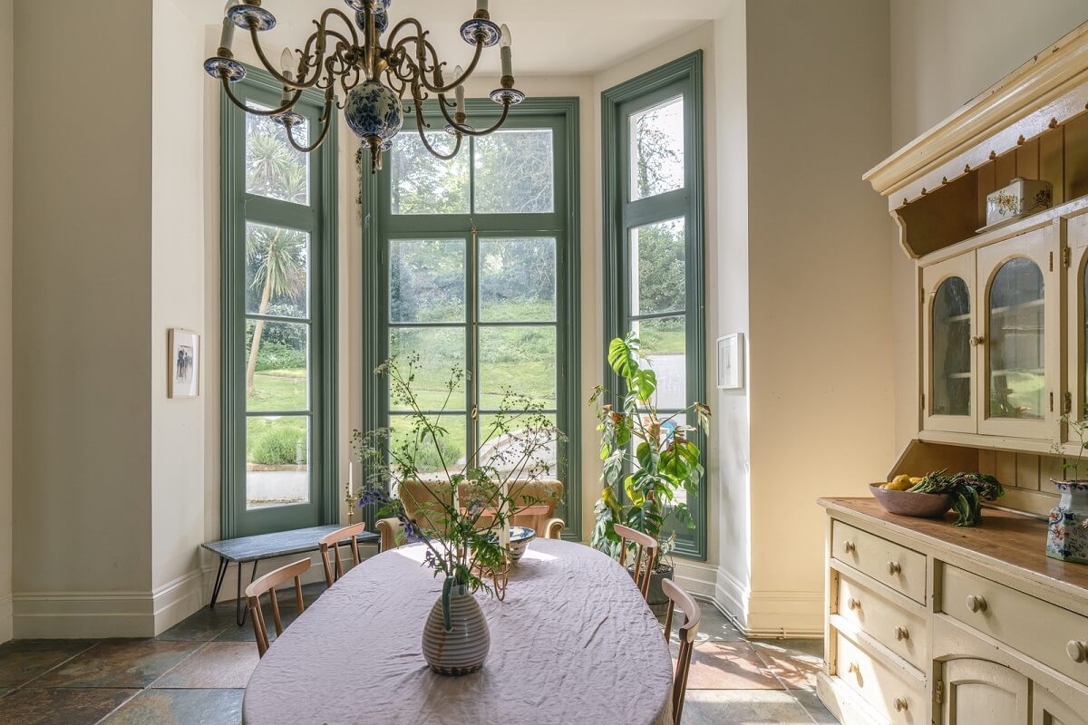 Grand Rooms and Vibrant Colors in an English Country Home 9 dining area with bay window nordroom