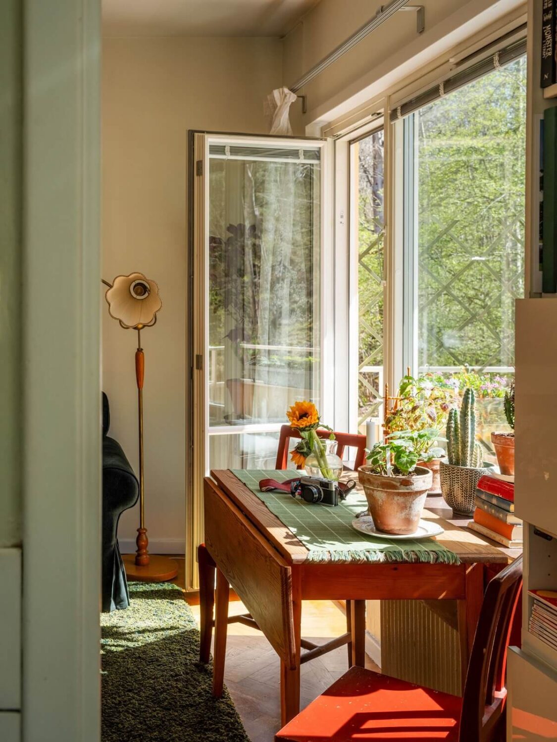 A Studio Apartment with Vintage Green Cabinets 9 dining table