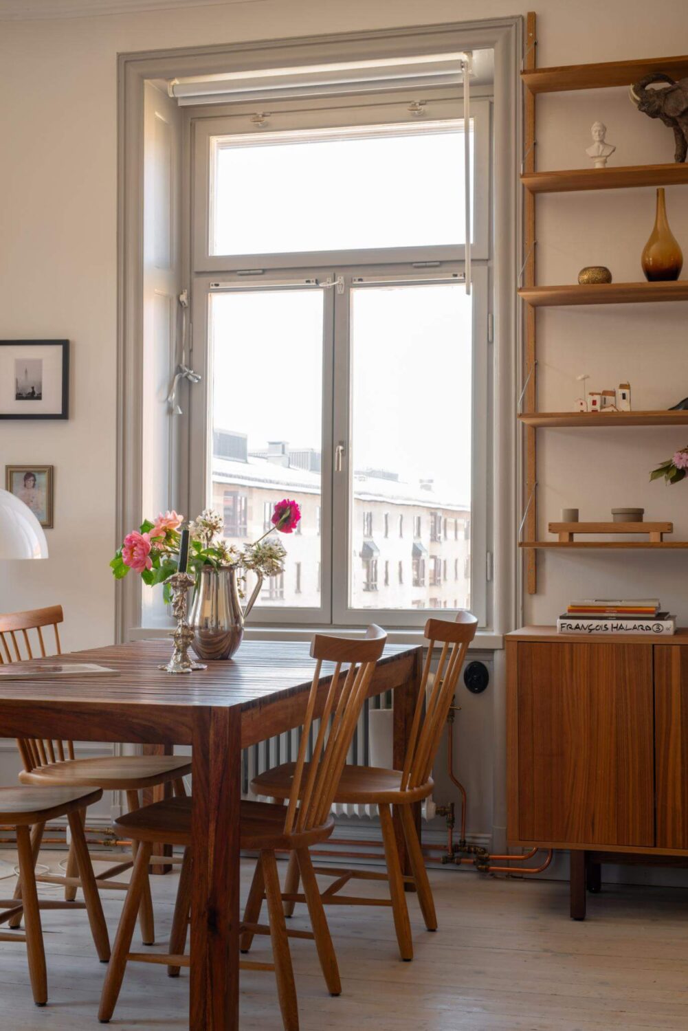 A Corner Apartment with an Industrial Style Kitchen 12 dining table